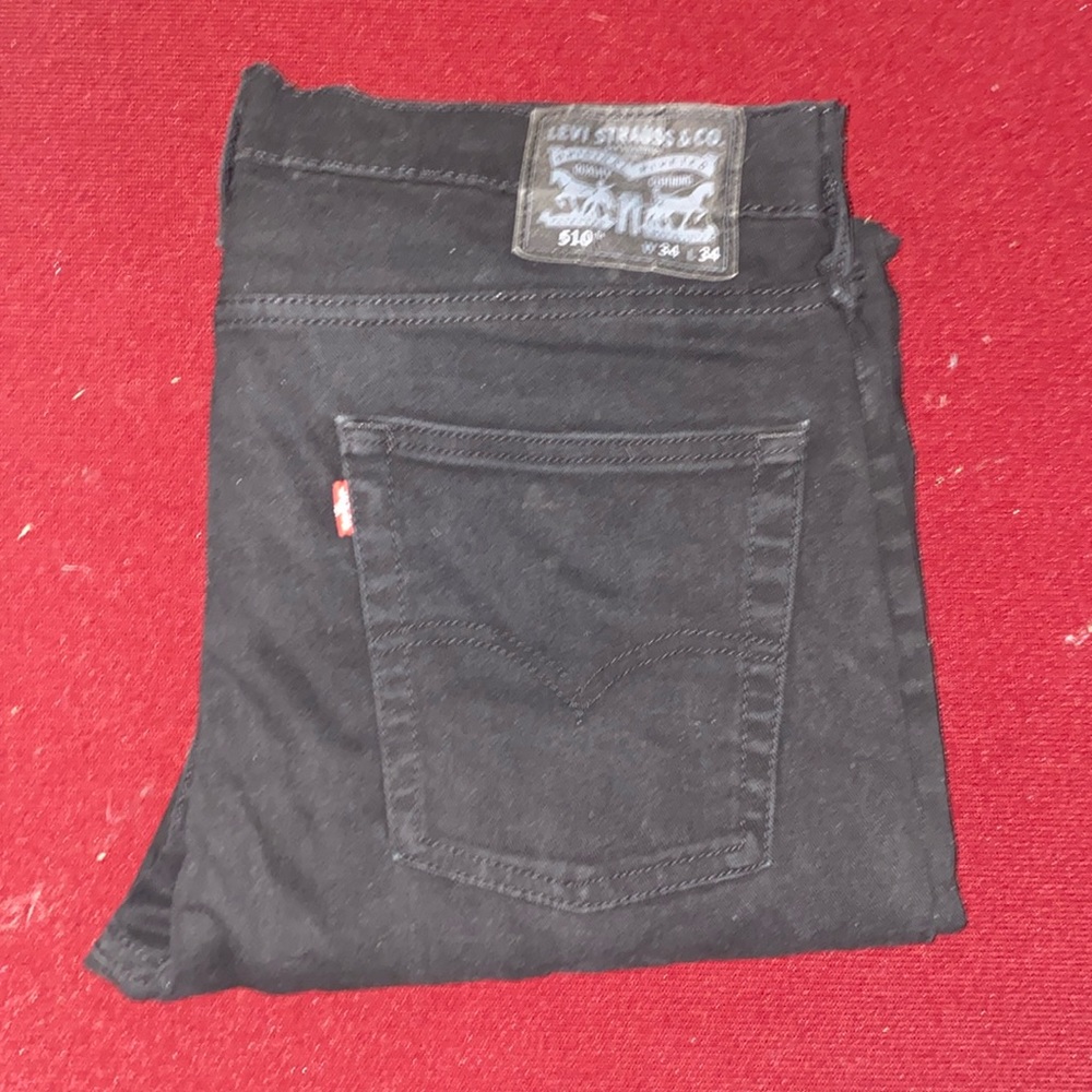 Size 34 x 34 5 tens Levi’s black denim vintage wear Slim.  Difficult to find.